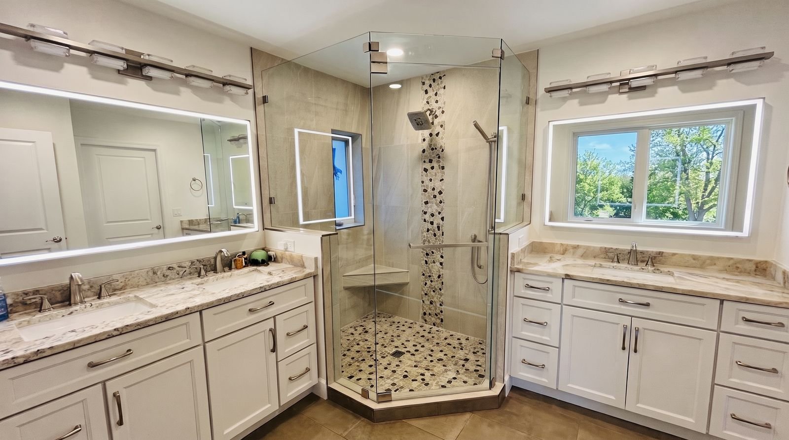 After: frameless neo-angle glass enclosure with lighted vanity mirror