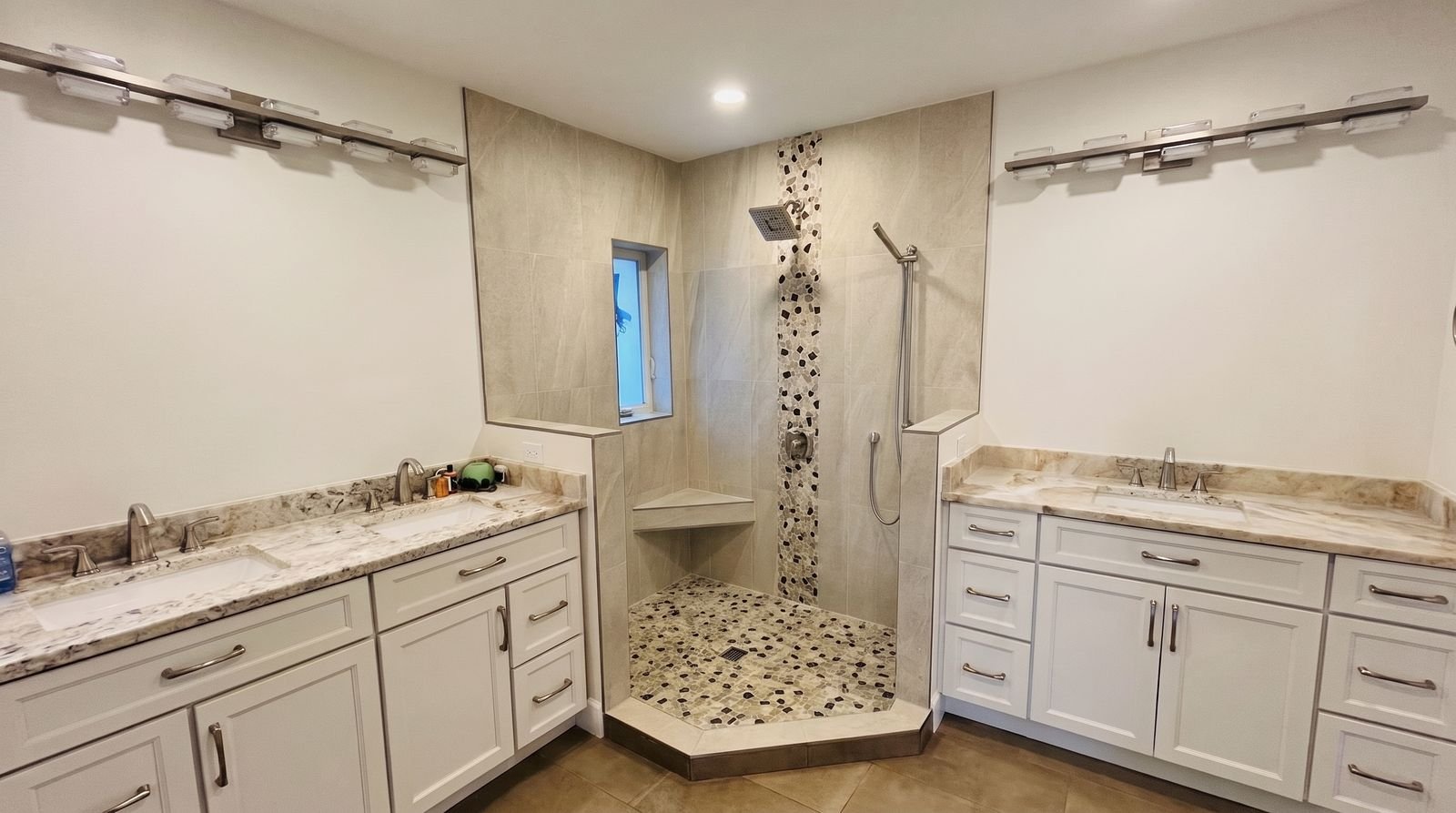 Before: open neo-angle shower between two vanities