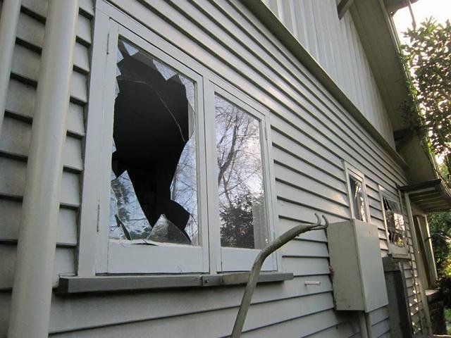 Broken window glass awaiting replacement